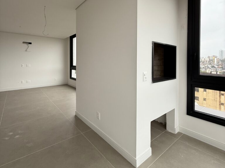 Revestimento de parede com reboco em gesso aplicado em ambiente interno